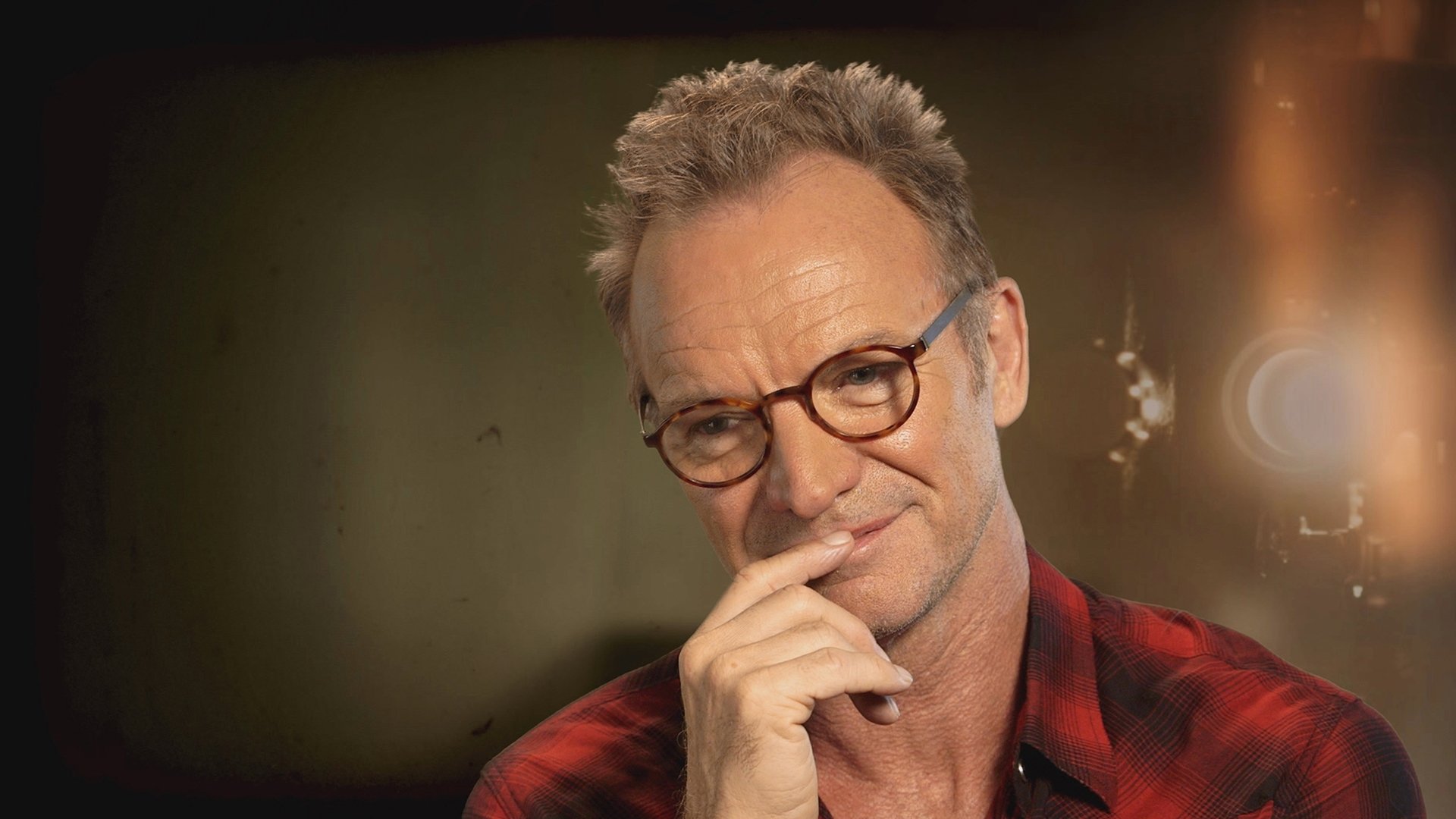 Sting: A Free Man Background