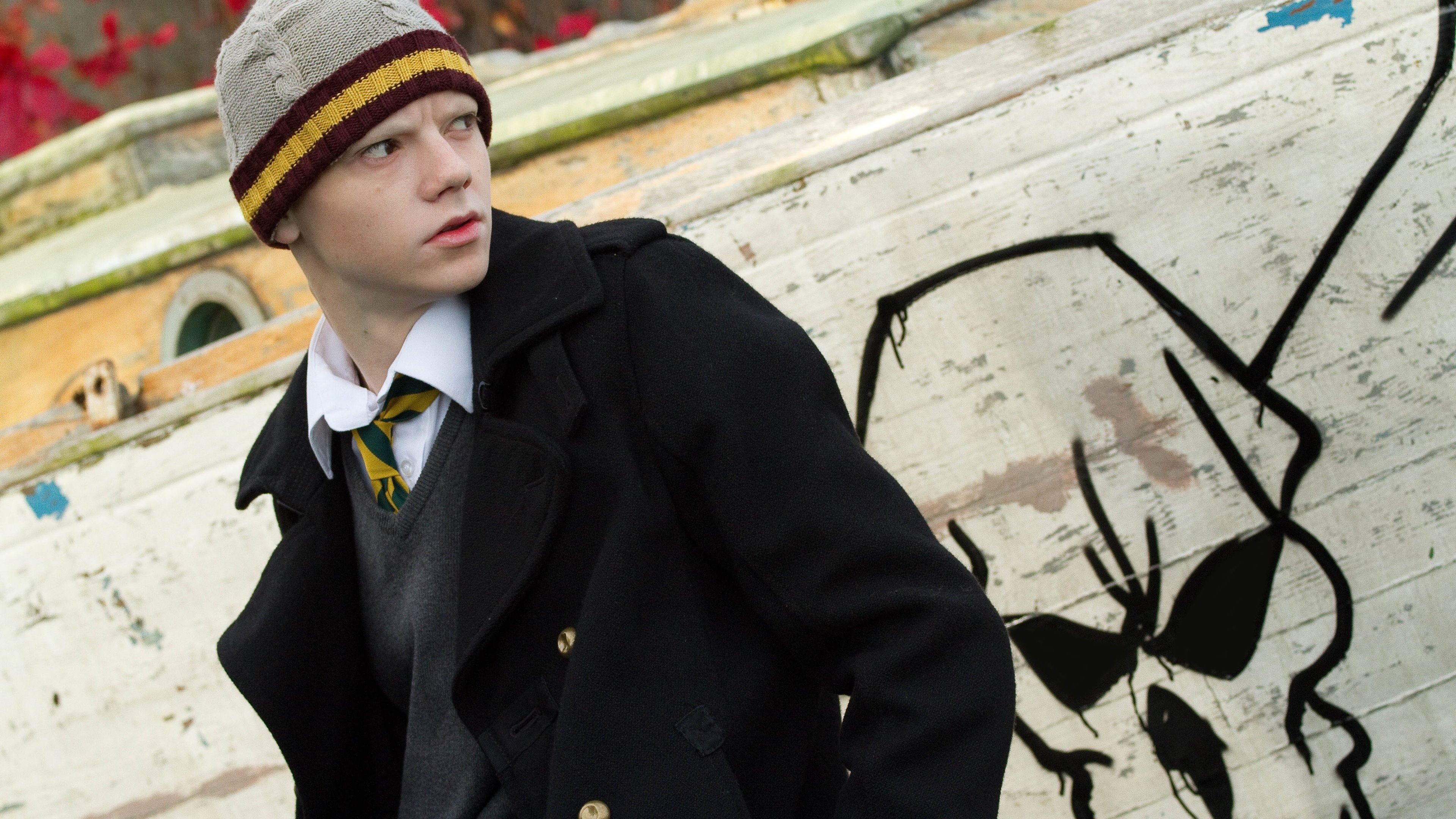 Death of a Superhero Background