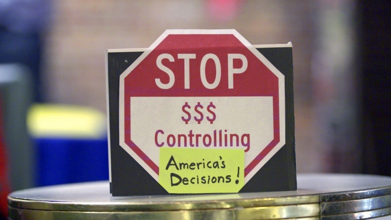 Democracy for $ale Background